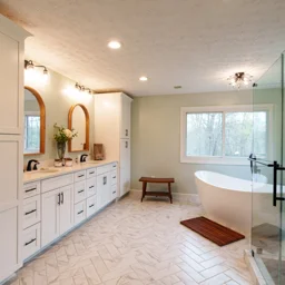 bathroom with double vanity with tub